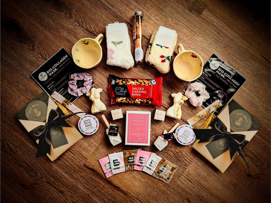 Book Bestie Bundle gift box for two featuring matching floral teacups, mystery books, and Venus candles