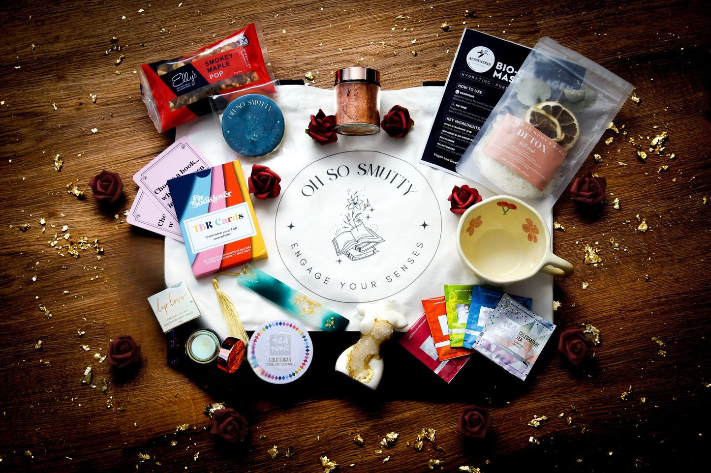 Ultimate luxury self-care hamper with floral teacup, crystal candle, and mystery romance book